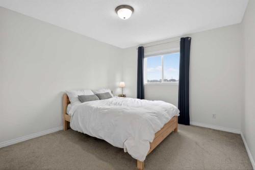 8050 Cougar Ridge Avenue Sw, Calgary, AB - Indoor Photo Showing Bedroom