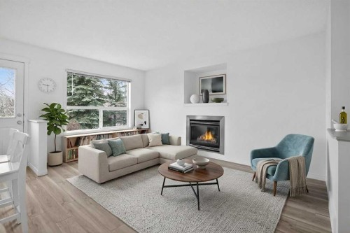 8050 Cougar Ridge Avenue Sw, Calgary, AB - Indoor Photo Showing Living Room With Fireplace