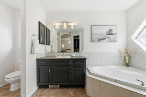 15 Valley Stream Manor Nw, Calgary, AB - Indoor Photo Showing Bedroom