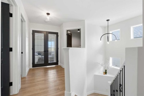 15 Valley Stream Manor Nw, Calgary, AB - Indoor Photo Showing Living Room