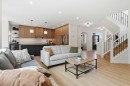 15 Valley Stream Manor Nw, Calgary, AB  - Indoor Photo Showing Living Room With Fireplace 