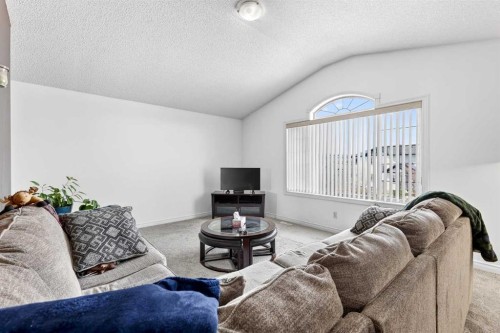 99 Evansmeade Crescent Nw, Calgary, AB - Indoor Photo Showing Living Room