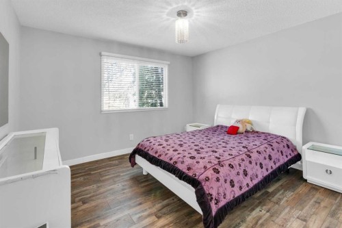 549 Rundleville Place Ne, Calgary, AB - Indoor Photo Showing Bedroom