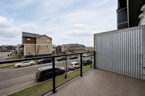 202-245 Redstone Walk Ne, Calgary, AB - Outdoor With Balcony With Exterior