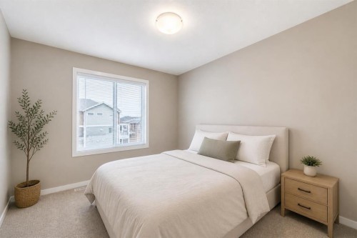 202-245 Redstone Walk Ne, Calgary, AB - Indoor Photo Showing Bedroom