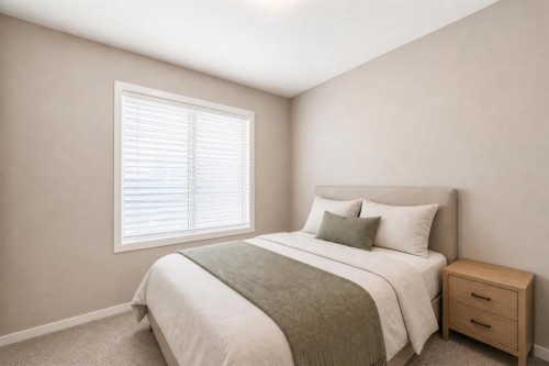 202-245 Redstone Walk Ne, Calgary, AB - Indoor Photo Showing Bedroom