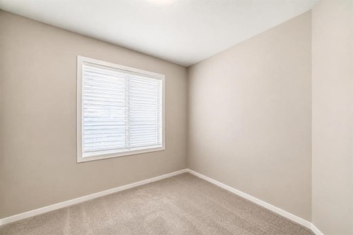 202-245 Redstone Walk Ne, Calgary, AB - Indoor Photo Showing Other Room