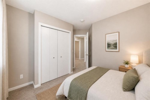 202-245 Redstone Walk Ne, Calgary, AB - Indoor Photo Showing Bedroom