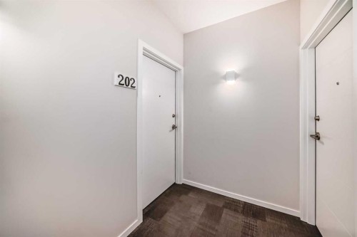 202-245 Redstone Walk Ne, Calgary, AB - Indoor Photo Showing Other Room