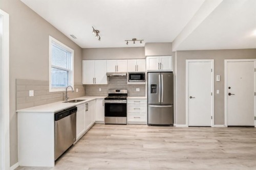 202-245 Redstone Walk Ne, Calgary, AB - Indoor Photo Showing Kitchen