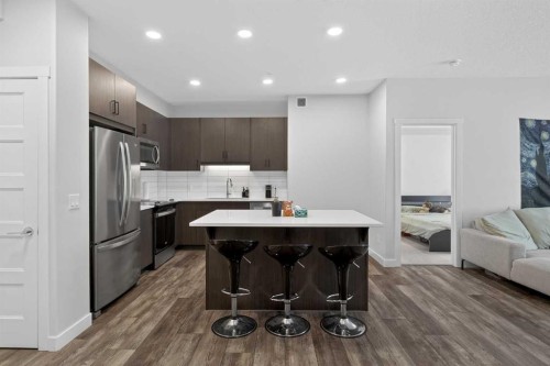 301-55 Wolf Hollow Crescent Se, Calgary, AB - Indoor Photo Showing Kitchen With Stainless Steel Kitchen With Upgraded Kitchen