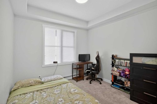 301-55 Wolf Hollow Crescent Se, Calgary, AB - Indoor Photo Showing Bedroom