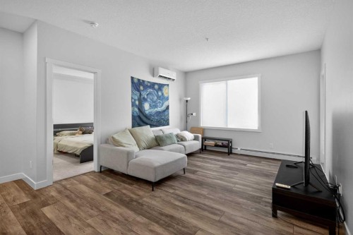 301-55 Wolf Hollow Crescent Se, Calgary, AB - Indoor Photo Showing Living Room