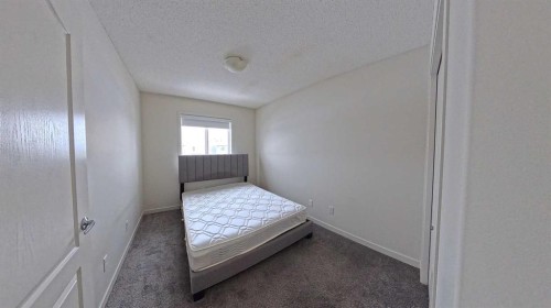 29 Evansridge Circle Nw, Calgary, AB - Indoor Photo Showing Bedroom