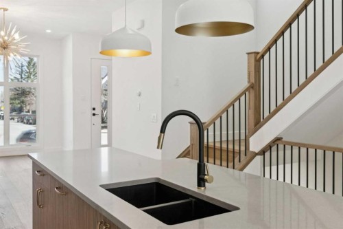 645 36 Street Sw, Calgary, AB - Indoor Photo Showing Kitchen With Double Sink