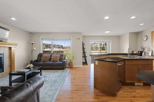 92 Covehaven Terrace Ne, Calgary, AB - Indoor Photo Showing Living Room With Fireplace