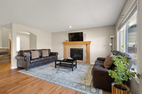 92 Covehaven Terrace Ne, Calgary, AB - Indoor Photo Showing Living Room With Fireplace