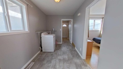 309 52 Avenue West, Claresholm, AB - Indoor Photo Showing Laundry Room