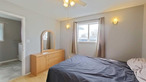 309 52 Avenue West, Claresholm, AB - Indoor Photo Showing Bedroom