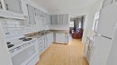 309 52 Avenue West, Claresholm, AB  - Indoor Photo Showing Kitchen With Double Sink 