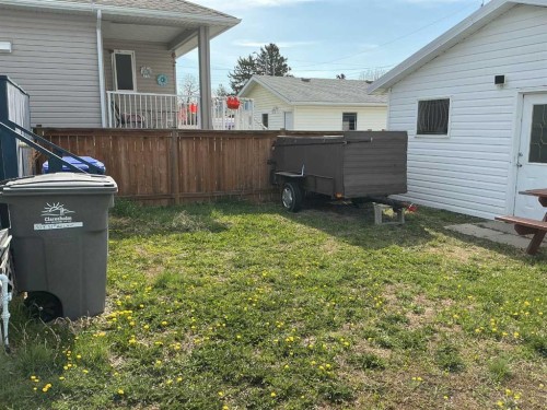 309 52 Avenue West, Claresholm, AB - Outdoor With Deck Patio Veranda With Exterior