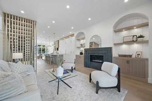 2708 18 Street Nw, Calgary, AB - Indoor Photo Showing Living Room With Fireplace