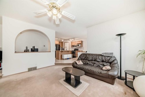 83 Hawkmount Green Nw, Calgary, AB - Indoor Photo Showing Living Room