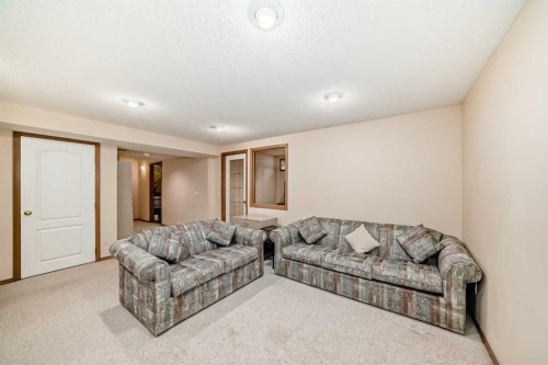 83 Hawkmount Green Nw, Calgary, AB - Indoor Photo Showing Living Room