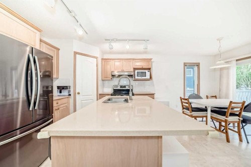 83 Hawkmount Green Nw, Calgary, AB - Indoor Photo Showing Kitchen With Double Sink