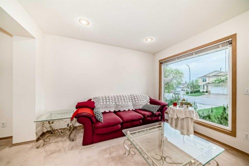 83 Hawkmount Green Nw, Calgary, AB - Indoor Photo Showing Living Room