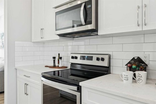 71 Sage Meadows Circle Nw, Calgary, AB - Indoor Photo Showing Kitchen With Upgraded Kitchen