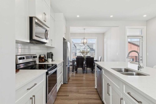71 Sage Meadows Circle Nw, Calgary, AB - Indoor Photo Showing Kitchen With Double Sink With Upgraded Kitchen