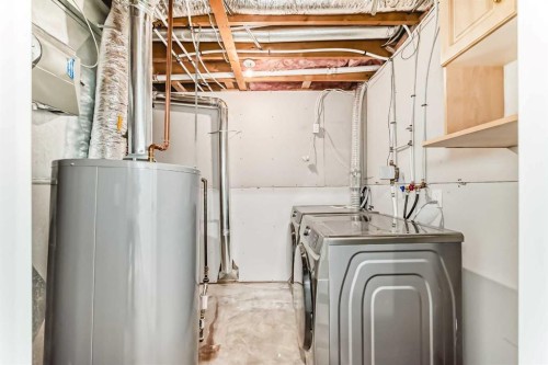 11323 Coventry Boulevard Ne, Calgary, AB - Indoor Photo Showing Laundry Room