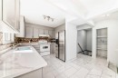 11323 Coventry Boulevard Ne, Calgary, AB  - Indoor Photo Showing Kitchen With Double Sink 