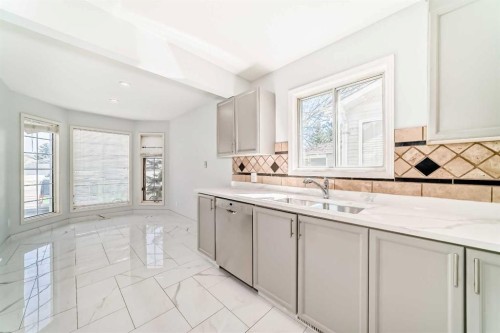11323 Coventry Boulevard Ne, Calgary, AB - Indoor Photo Showing Kitchen With Double Sink