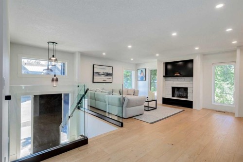 1206 Varsity Estates Road Nw, Calgary, AB - Indoor Photo Showing Living Room With Fireplace