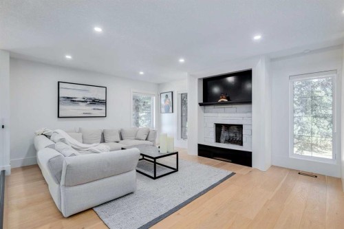 1206 Varsity Estates Road Nw, Calgary, AB - Indoor Photo Showing Living Room With Fireplace