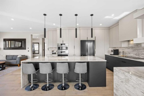 3 Tremblant Point Sw, Calgary, AB - Indoor Photo Showing Kitchen With Upgraded Kitchen