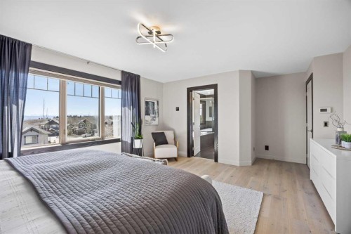 3 Tremblant Point Sw, Calgary, AB - Indoor Photo Showing Bedroom