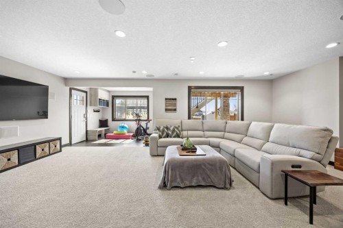 3 Tremblant Point Sw, Calgary, AB - Indoor Photo Showing Living Room