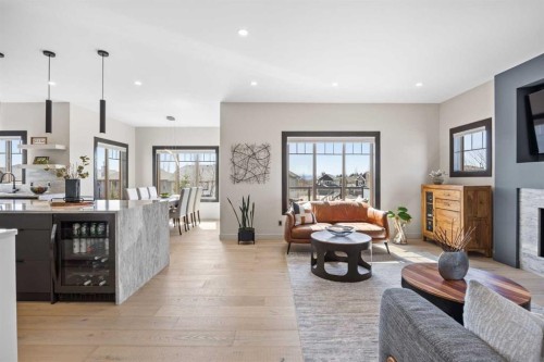 3 Tremblant Point Sw, Calgary, AB - Indoor Photo Showing Living Room With Fireplace
