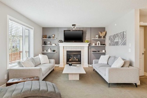 826 Wentworth Place Sw, Calgary, AB - Indoor Photo Showing Living Room With Fireplace