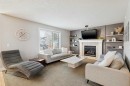 826 Wentworth Place Sw, Calgary, AB  - Indoor Photo Showing Living Room With Fireplace 