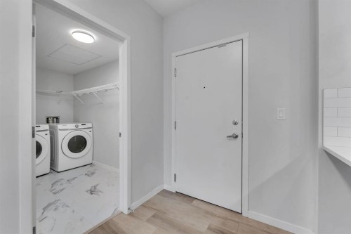 3201-220 Seton Grove Se, Calgary, AB - Indoor Photo Showing Laundry Room