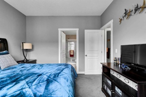 410 Cranford Walk Se, Calgary, AB - Indoor Photo Showing Bedroom