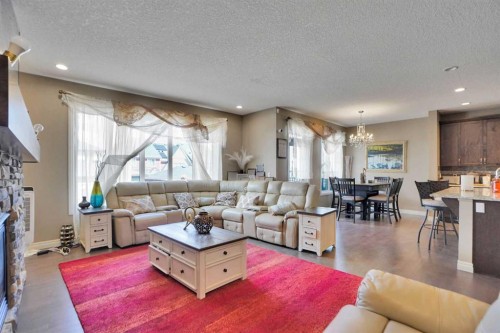 46 Mahogany Passage Se, Calgary, AB - Indoor Photo Showing Living Room With Fireplace
