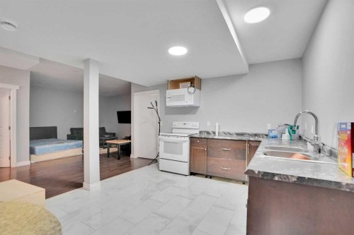 46 Mahogany Passage Se, Calgary, AB - Indoor Photo Showing Kitchen With Double Sink