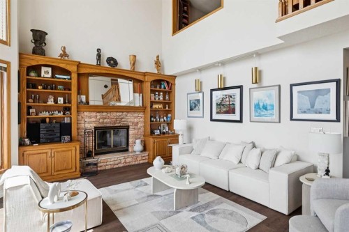55 Edenstone View Nw, Calgary, AB - Indoor Photo Showing Living Room With Fireplace