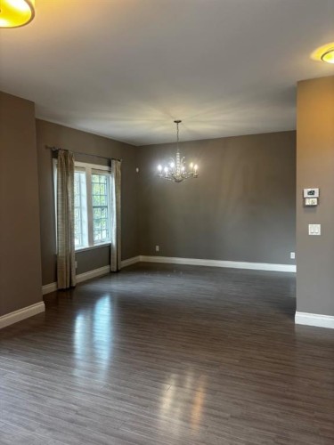1 Murmansk Way Sw, Calgary, AB - Indoor Photo Showing Other Room