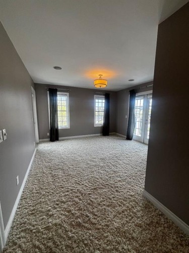 1 Murmansk Way Sw, Calgary, AB - Indoor Photo Showing Other Room